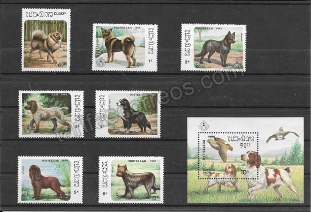 Filatelia sellos serie y hojita de perros Laos 