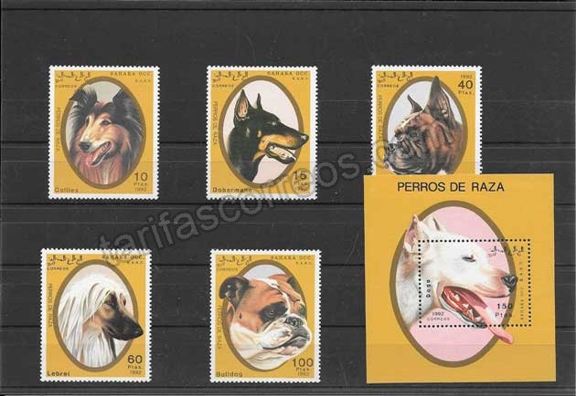 Filatelia sellos serie y hojita de perros.